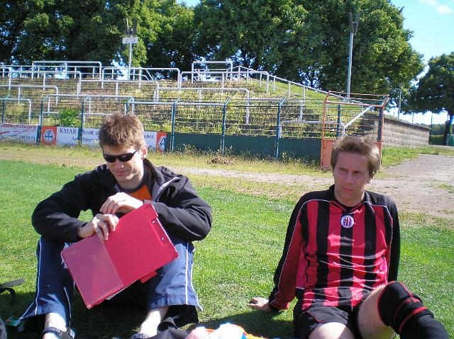 Jon and Richard.JPG - Jon makes tactical notes on the back of his hand. The stadium has not seen 10,000 crowds for sometime